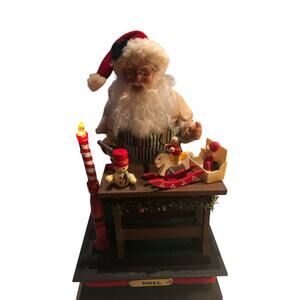 Vintage Santa Working making toys. Candle lights up and music works.